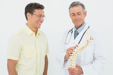 Chiropractor and Patient