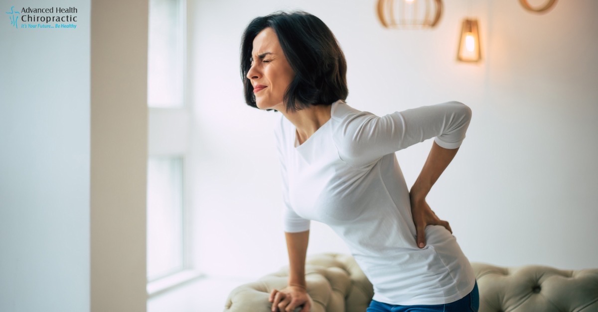 Chiropractor providing back pain relief for summer activities
